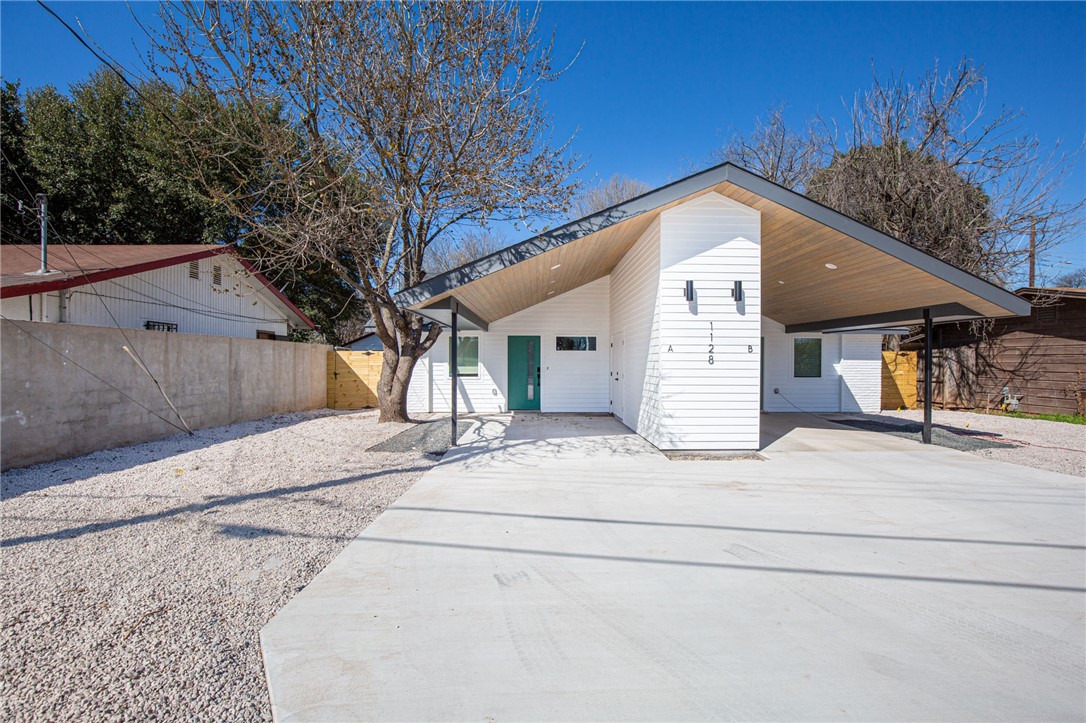 1128 Gardner Road, Unit B Austin, TX 78721 - Photo 22 of 25 Plenty of parking under right side of carport and alongside it on driveway.