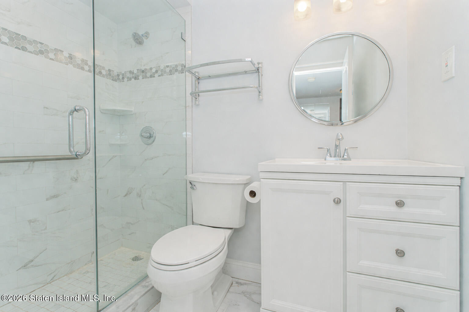 4199A Amboy Road, Unit 5A Staten Island, NY 10308 - Photo 15 of 19 a bathroom with a sink toilet and shower