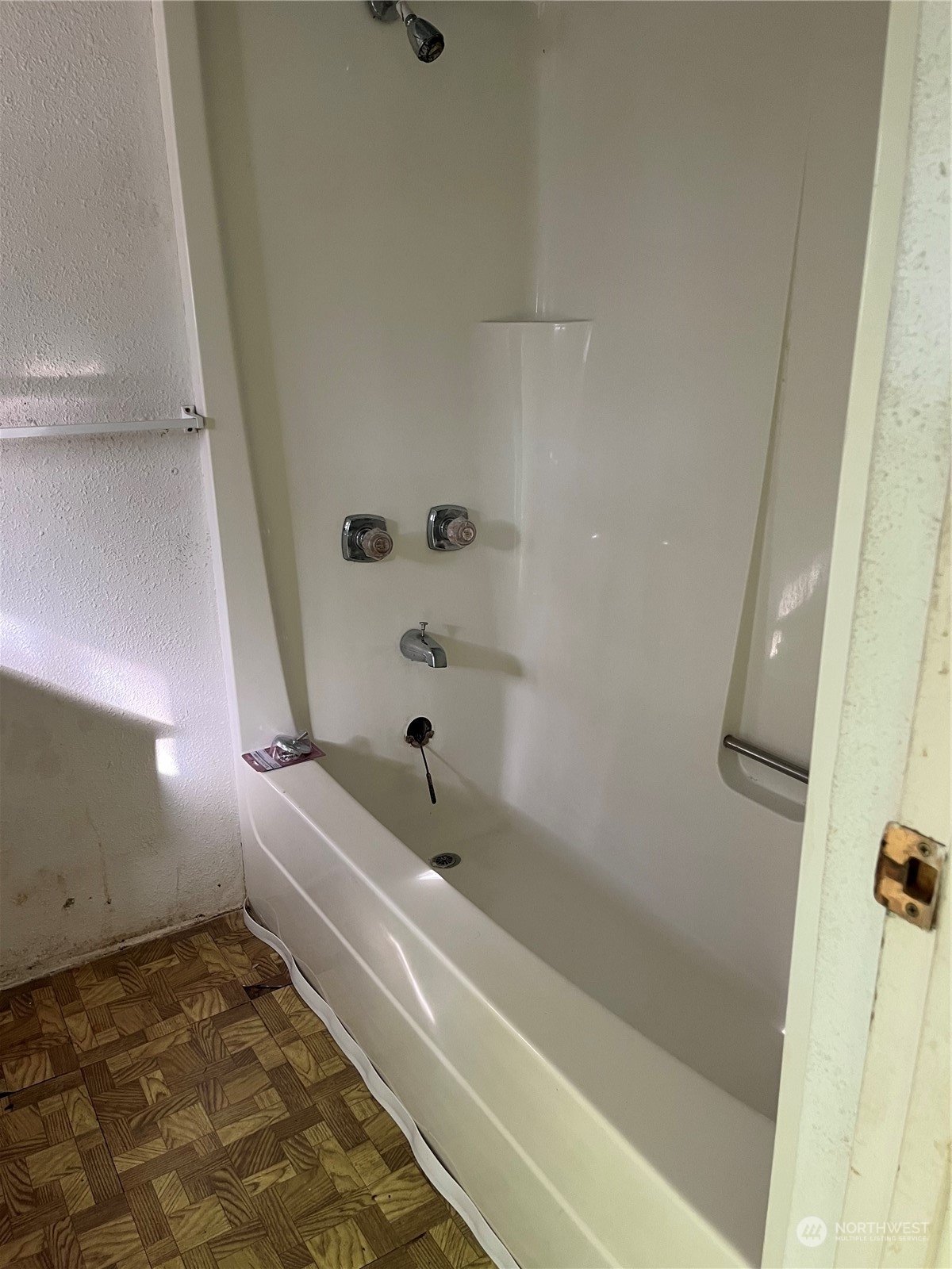 1481 Griffith Point Road Nordland, WA 98358 - Photo 25 of 39 a bathroom with a bathtub and a shower