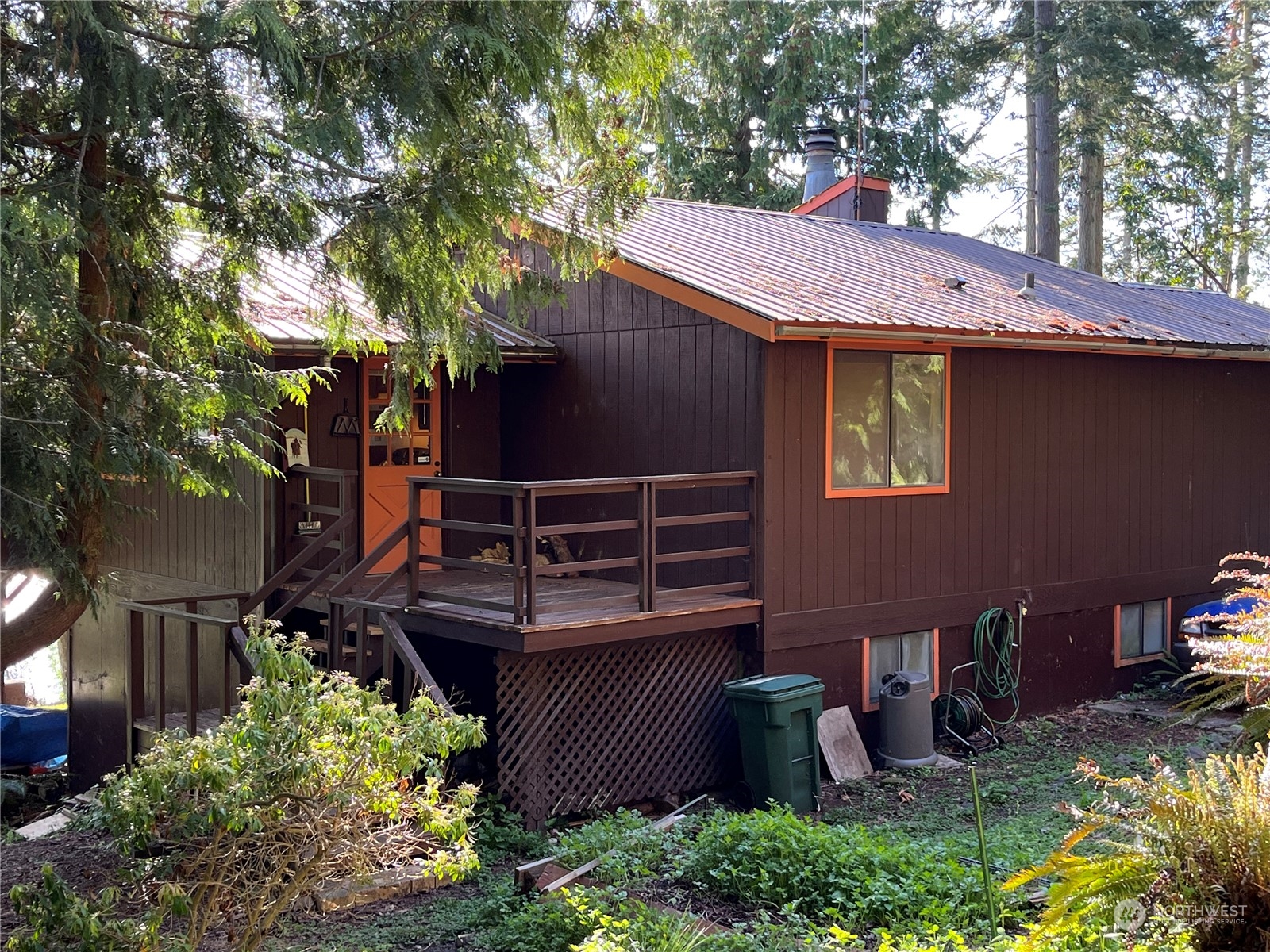 1481 Griffith Point Road Nordland, WA 98358 - Photo 5 of 39 a view of a house with a patio