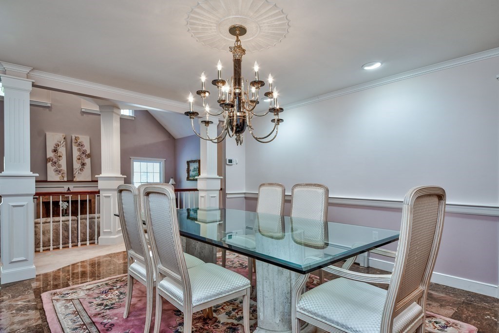 6 Barnbridge Circle Framingham, MA 01701 - Photo 20 of 41 a table room with furniture and chandelier