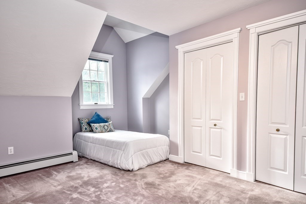 6 Barnbridge Circle Framingham, MA 01701 - Photo 33 of 41 a spacious bedroom with a bed and a window