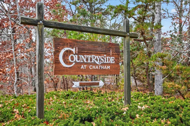 a sign broad in front of a building