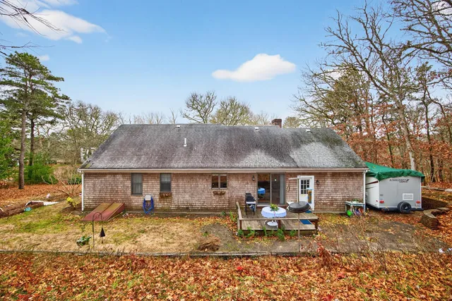 a view of a house with sitting area and furniture