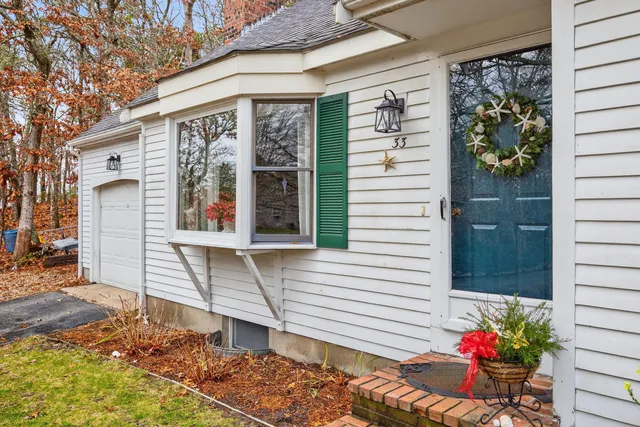 a front view of a house with a porch