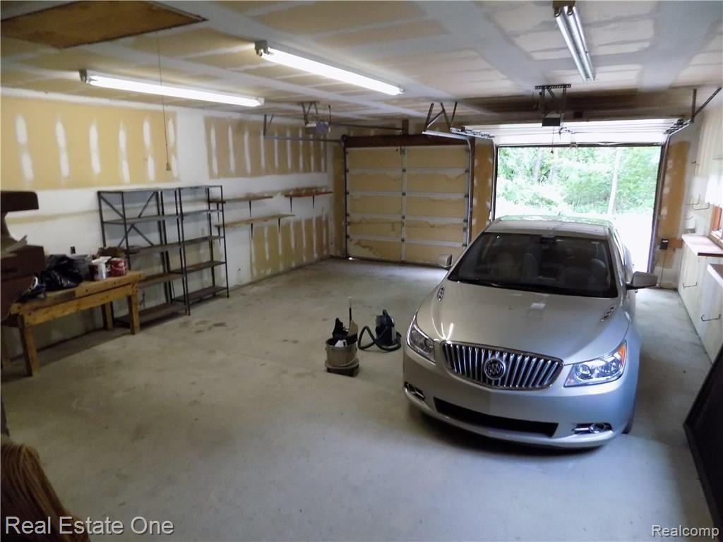 4650 Clyde Road Holly, MI 48442 - Photo 63 of 68 Extra deep two car garage