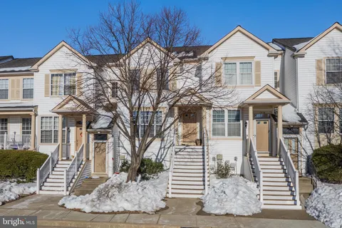 a front view of a house with a porch