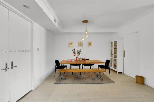 a view of a dining room with furniture