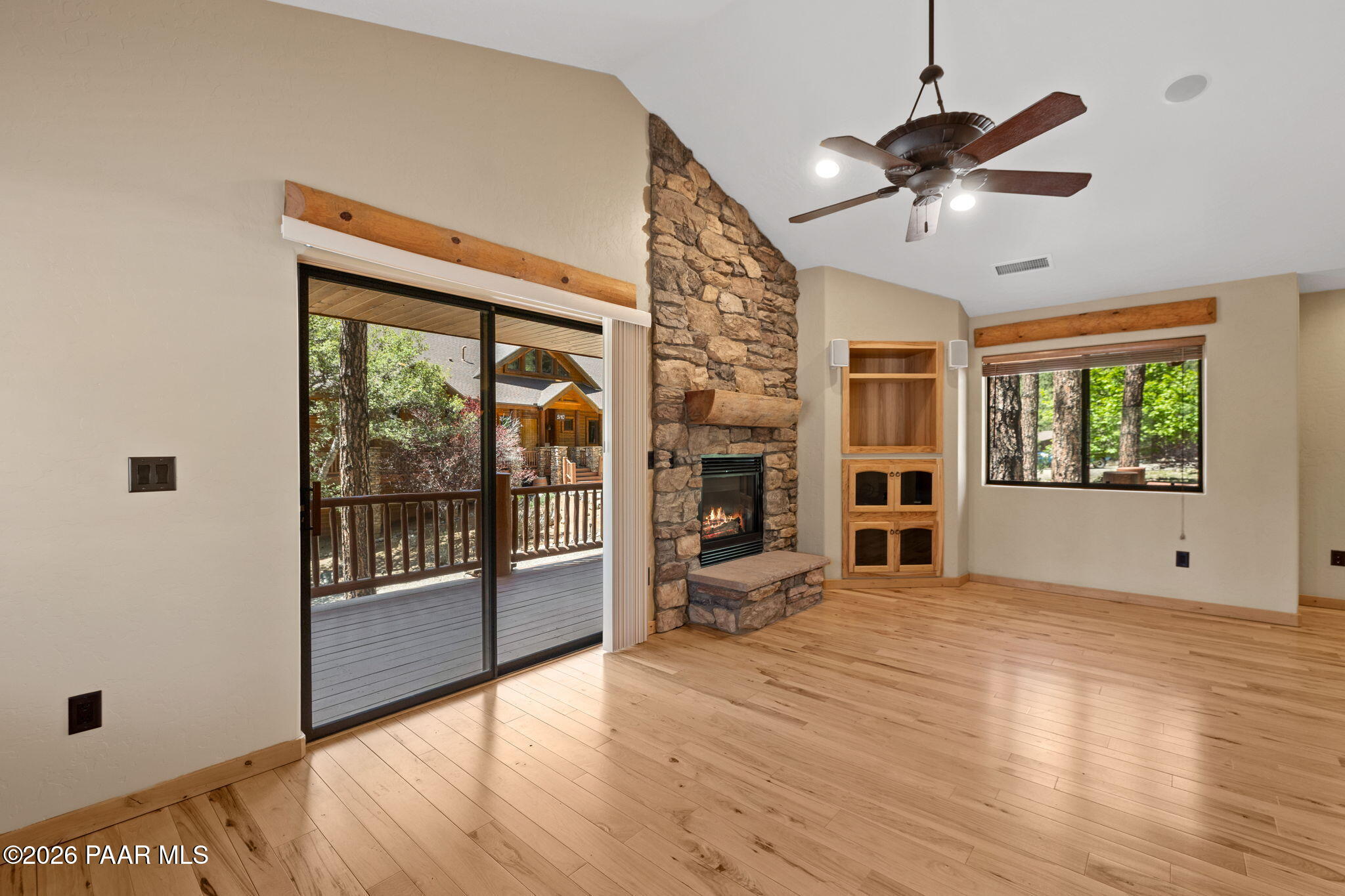 5140 East Charcoal Kiln Road Prescott, AZ 86303 - Photo 123 of 140 a view of an empty room with a window and wooden floor