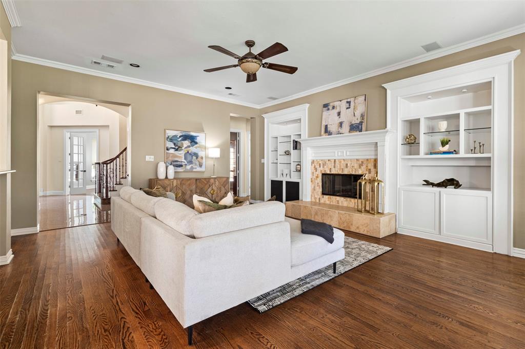 2070 Azalea Trail Irving, TX 75063 - Photo 11 of 36 a living room with furniture and a fireplace