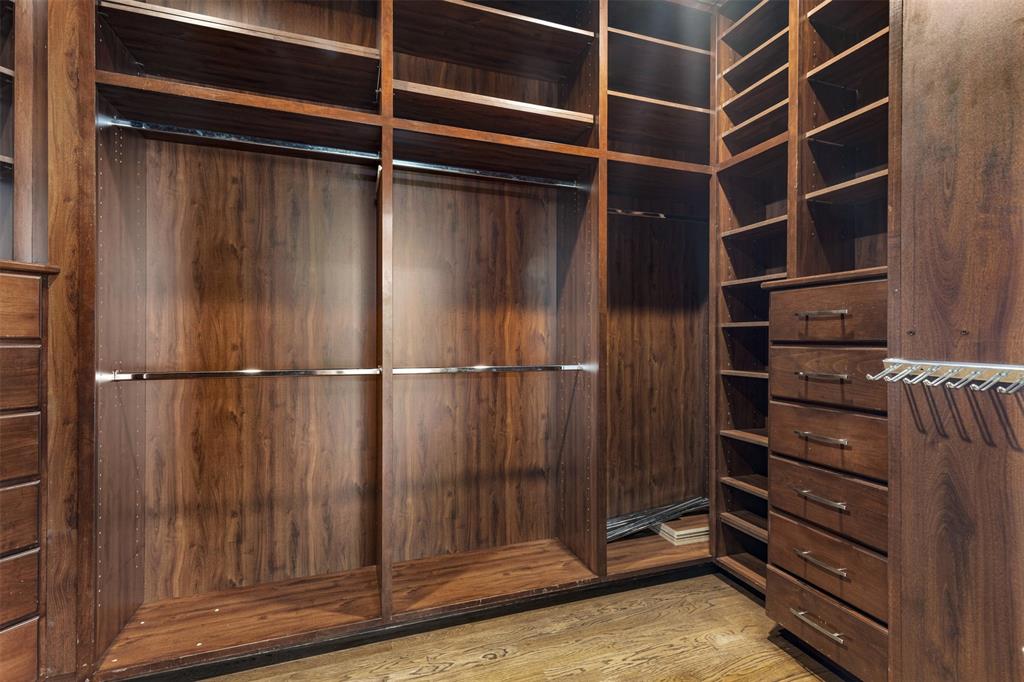 2070 Azalea Trail Irving, TX 75063 - Photo 17 of 36 a view of walk in closet with empty racks
