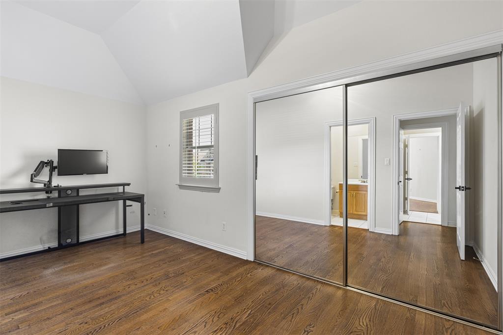 2070 Azalea Trail Irving, TX 75063 - Photo 23 of 36 a view of a kitchen with wooden floor and electronic appliances