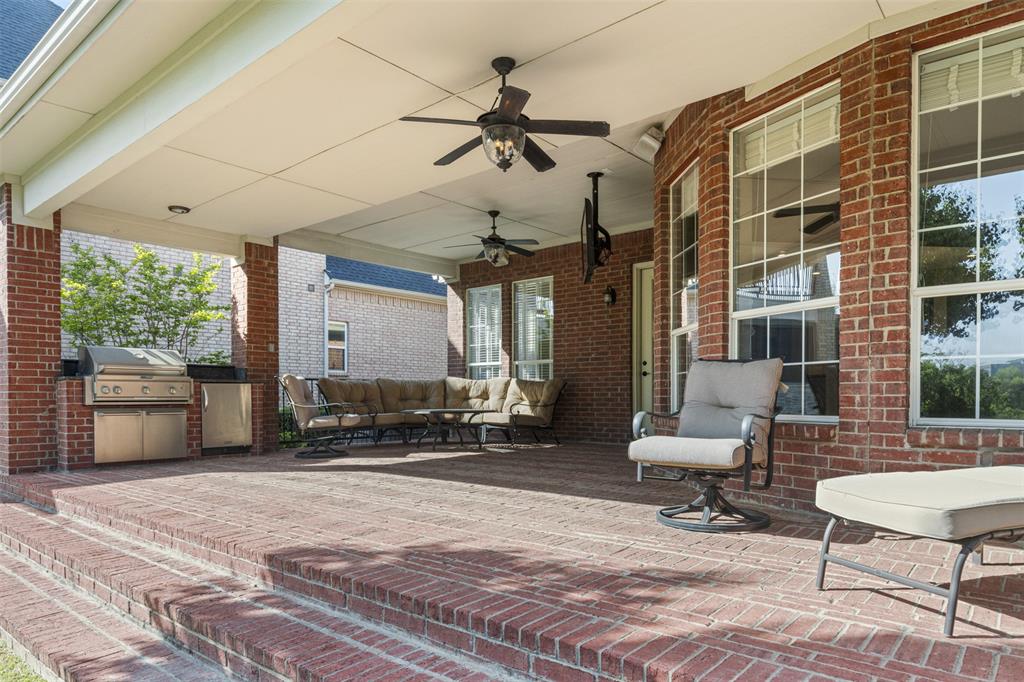 2070 Azalea Trail Irving, TX 75063 - Photo 33 of 36 a building outdoor space with patio furniture and potted plants