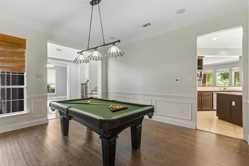 2070 Azalea Trail Irving, TX 75063 - Photo 7 of 36 a room with pool table and windows