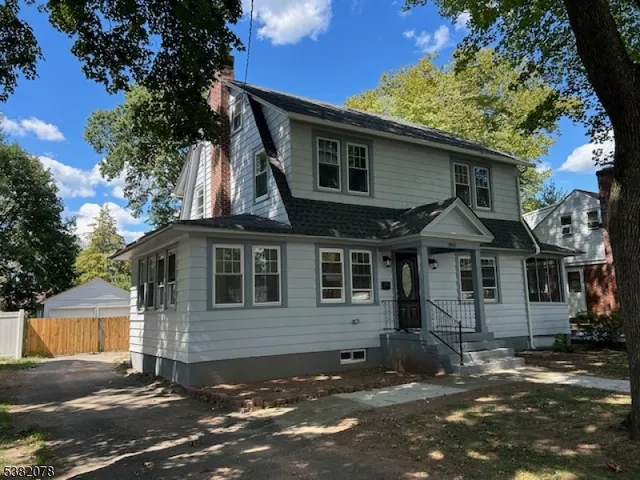 front view of a house with a street