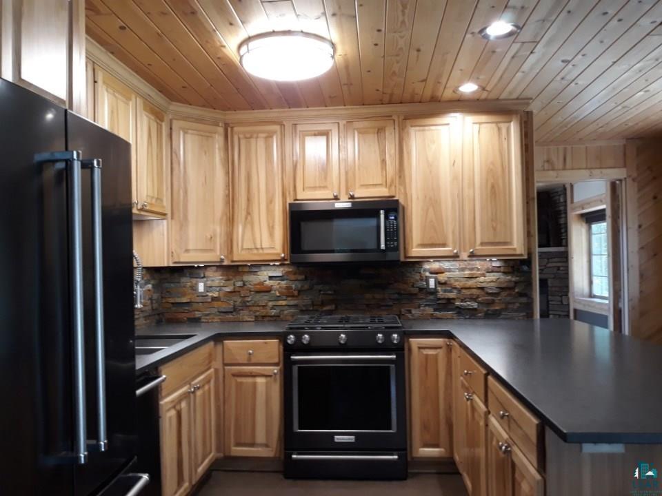 5100 Hokkanen Road Iron River, WI 54847 - Photo 21 of 48 Hickory cabinet