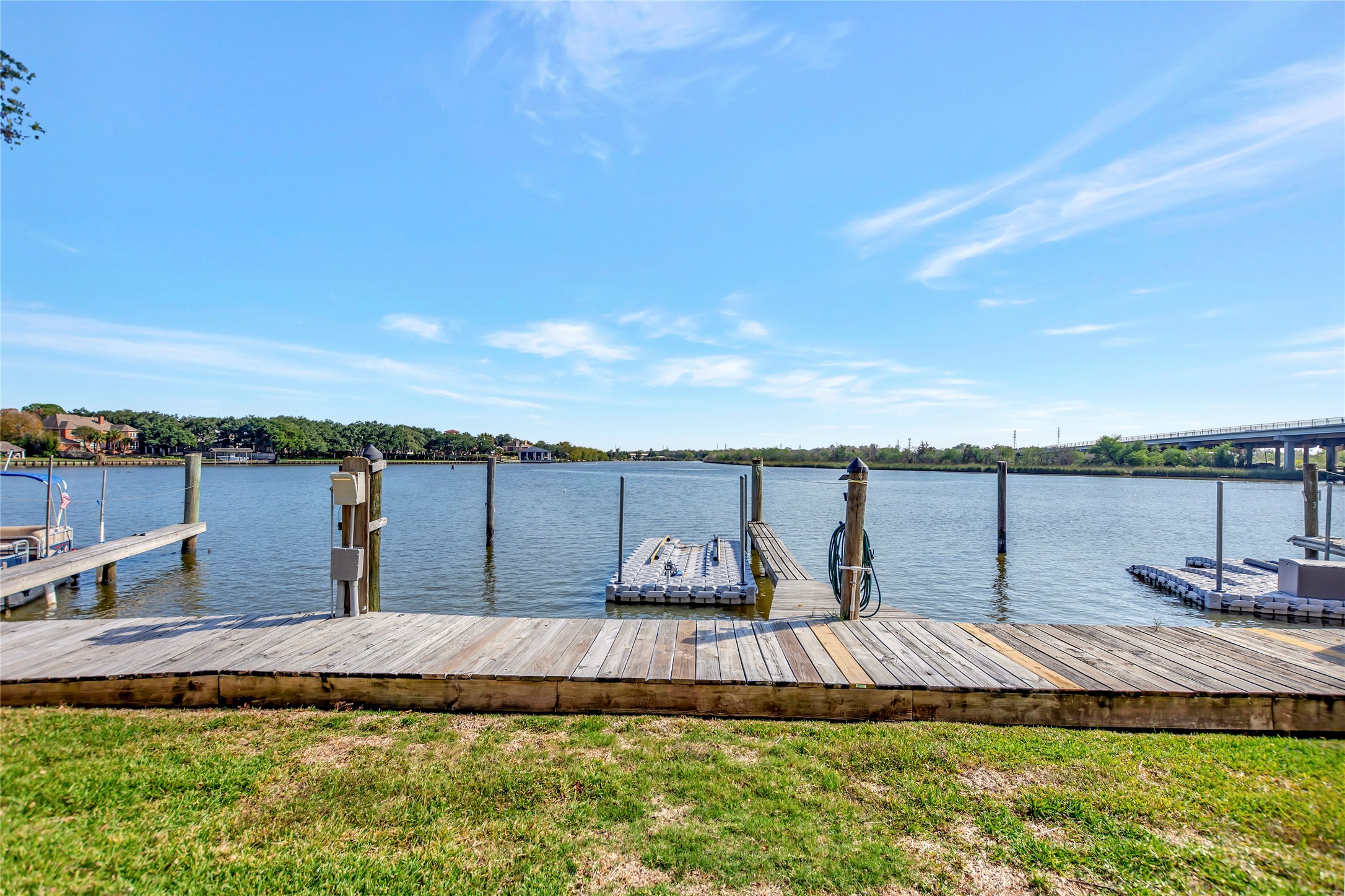 18809 Egret Bay Boulevard, Unit 112 Webster, TX 77058 - Photo 39 of 48 a view of a swimming pool and lounge chairs