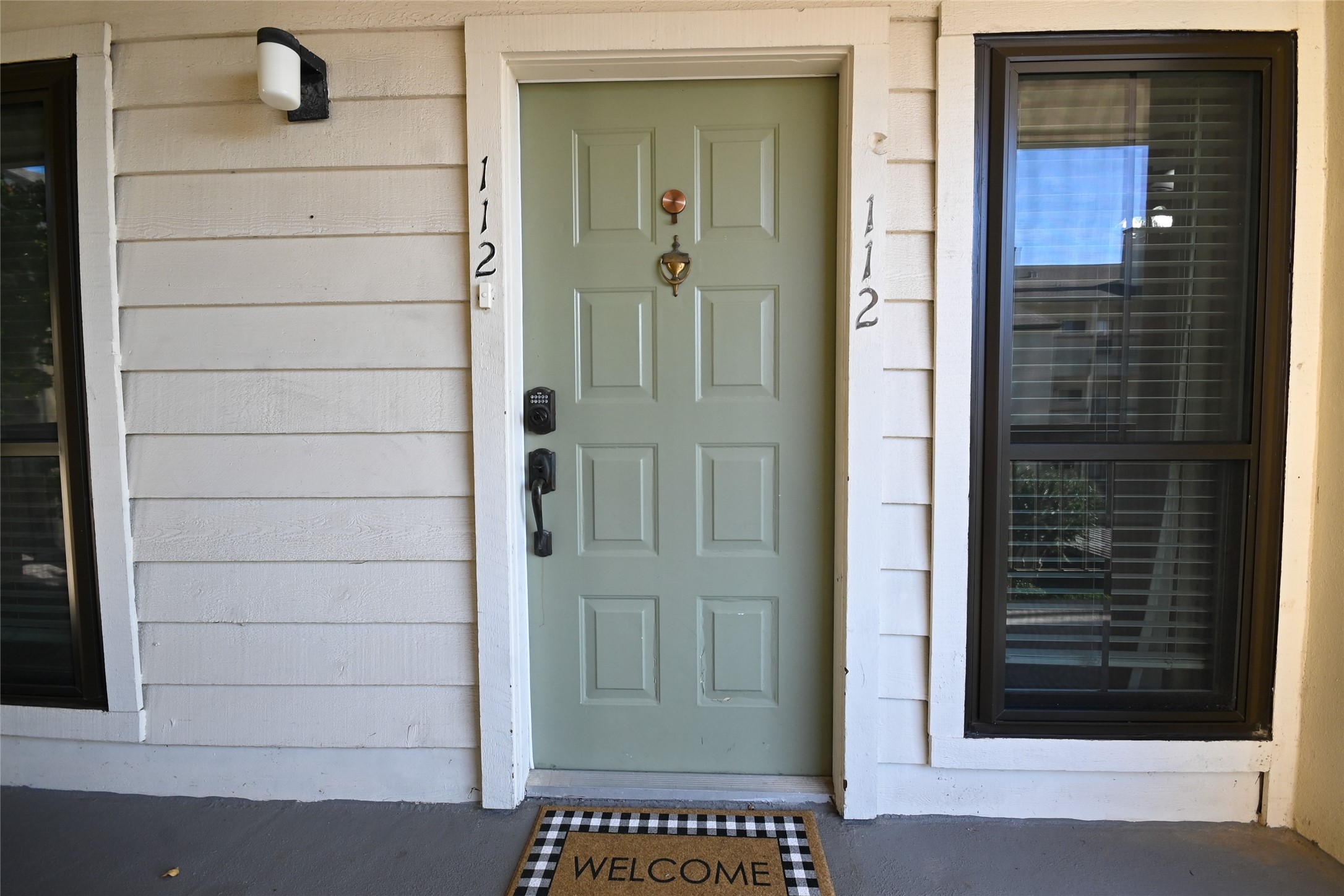 18809 Egret Bay Boulevard, Unit 112 Webster, TX 77058 - Photo 41 of 48 a view of a door and an entryway door