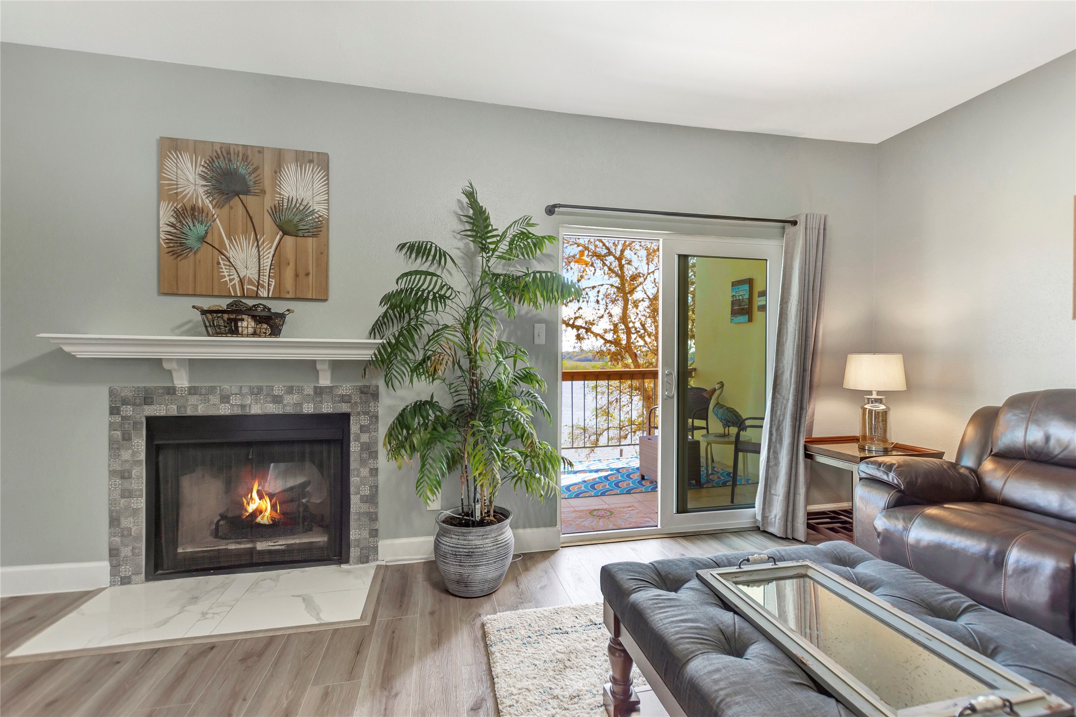18809 Egret Bay Boulevard, Unit 112 Webster, TX 77058 - Photo 7 of 48 a living room with furniture and a fireplace