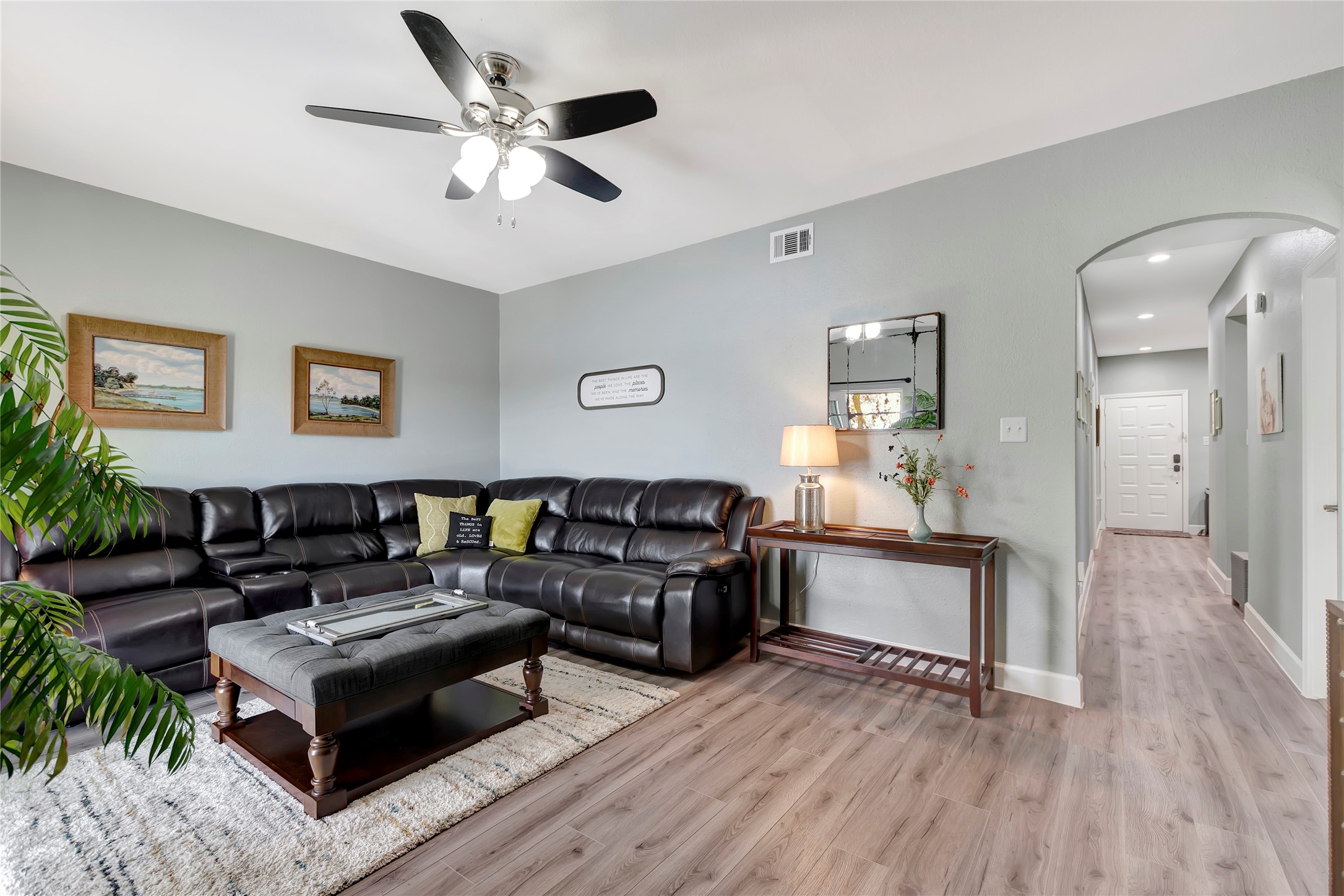 18809 Egret Bay Boulevard, Unit 112 Webster, TX 77058 - Photo 8 of 48 a living room with furniture and wooden floor