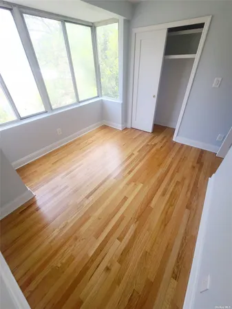 a view of an empty room and window
