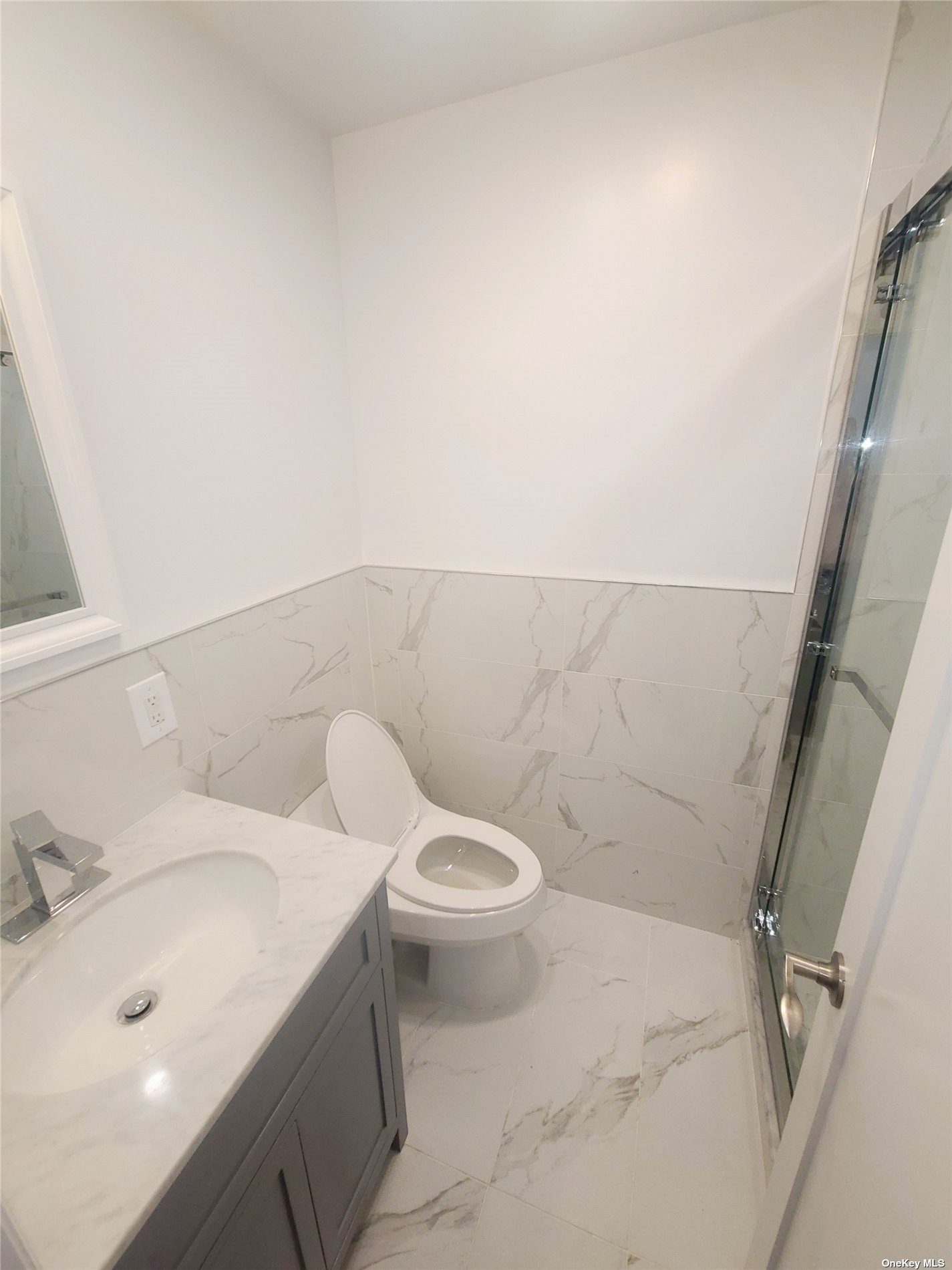 67-39 Clyde Street, Unit G Queens, NY 11375 - Photo 21 of 23 a bathroom with a sink and toilet