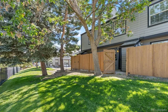 a view of a back yard of the house