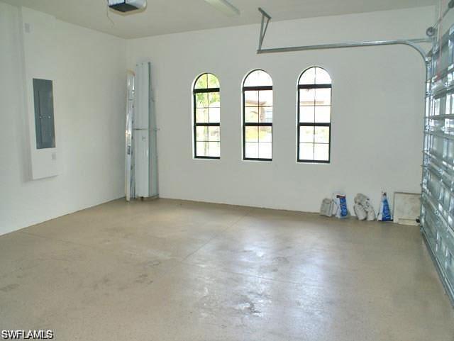 7414 Acorn Way Naples, FL 34119 - Photo 11 of 24 an empty room with windows