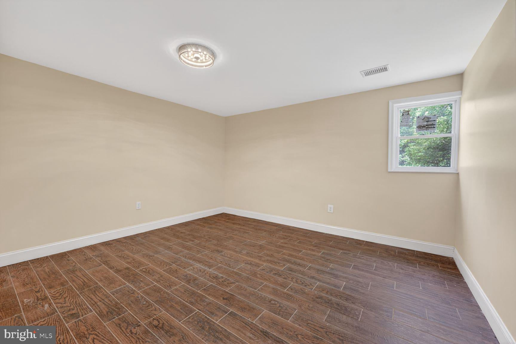 7205 Livingston Road Oxon Hill, MD 20745 - Photo 22 of 25 Spacious room with natural light.