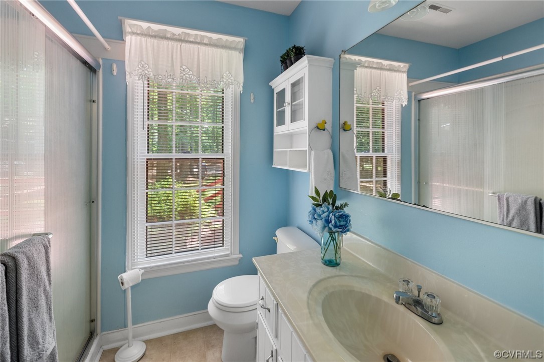 12441 Spring Run Road Chesterfield, VA 23832 - Photo 14 of 28 a bathroom with a granite countertop sink toilet and shower
