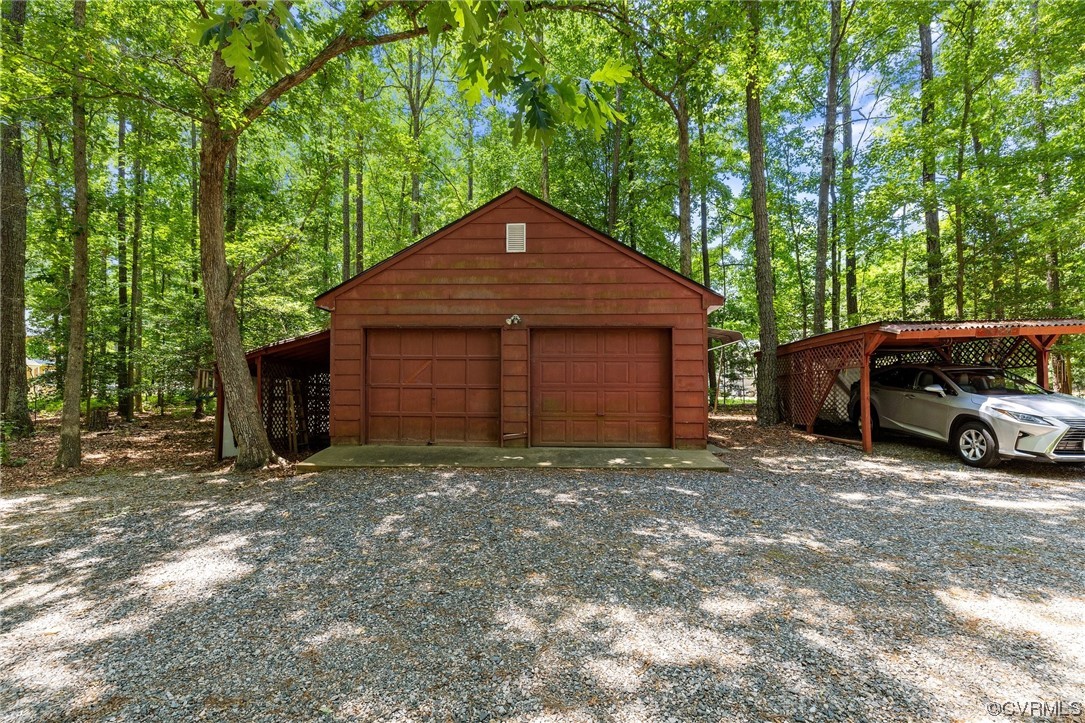 12441 Spring Run Road Chesterfield, VA 23832 - Photo 25 of 28 a front view of a house with a garage