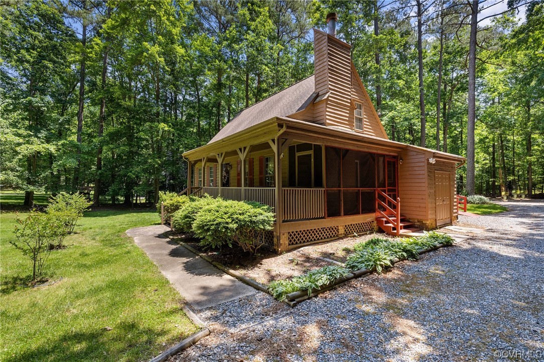 12441 Spring Run Road Chesterfield, VA 23832 - Photo 28 of 28 a front view of a house with a yard and potted plants
