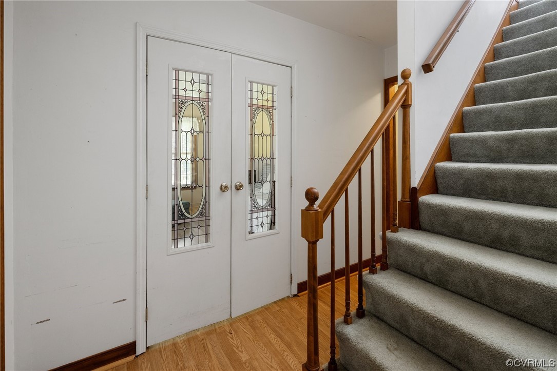 12441 Spring Run Road Chesterfield, VA 23832 - Photo 5 of 28 a view of entryway with wooden floor and stairs