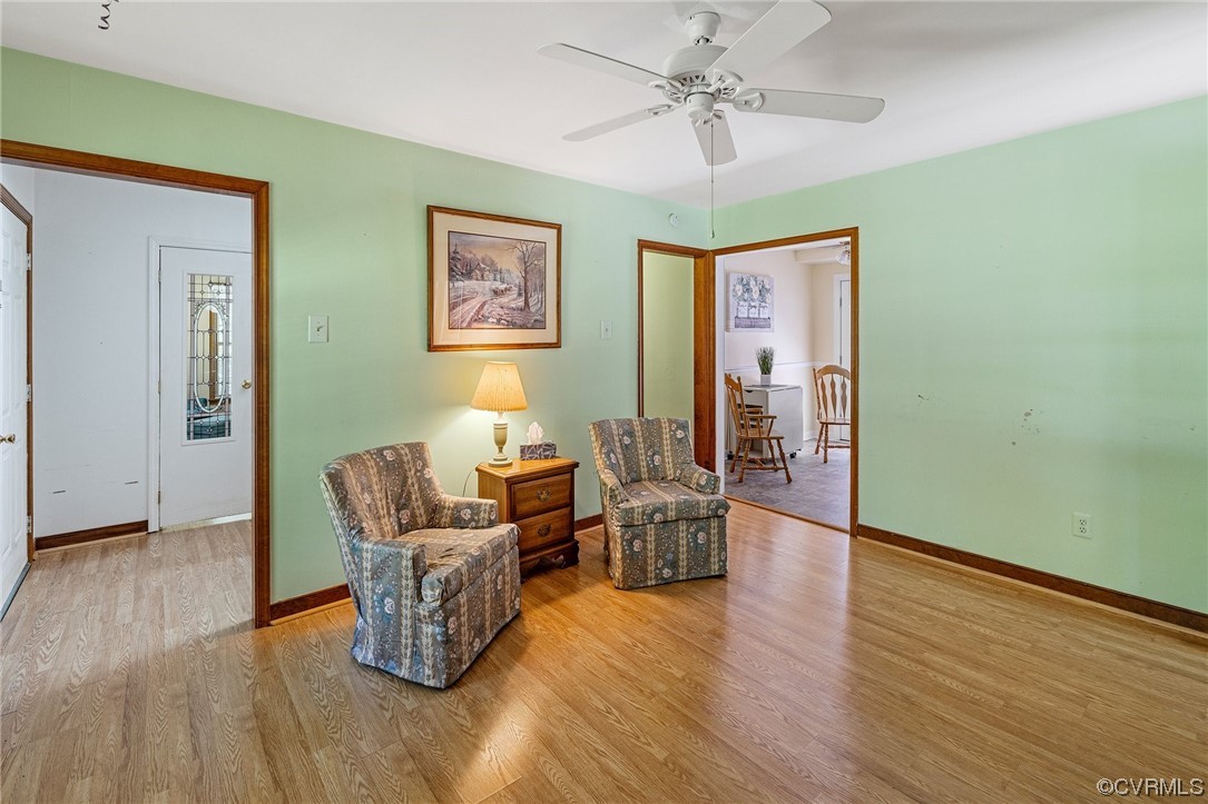 12441 Spring Run Road Chesterfield, VA 23832 - Photo 8 of 28 a living room with furniture and a wooden floor