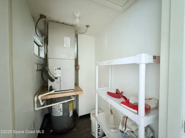 a room with storage and utility