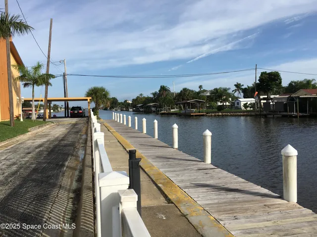 a view of a lake with a sitting area