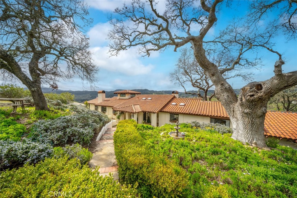 9205 Balboa Road Atascadero, CA 93422 - Photo 1 of 1 an aerial view of a house with garden space and street view