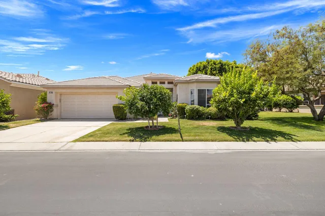 a view of house with outdoor space and street view
