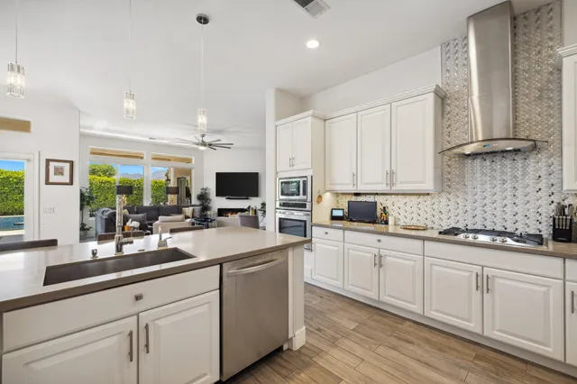 a bedroom with bed and a flat screen tv