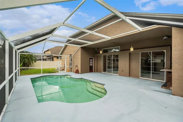 a view of a backyard of a house