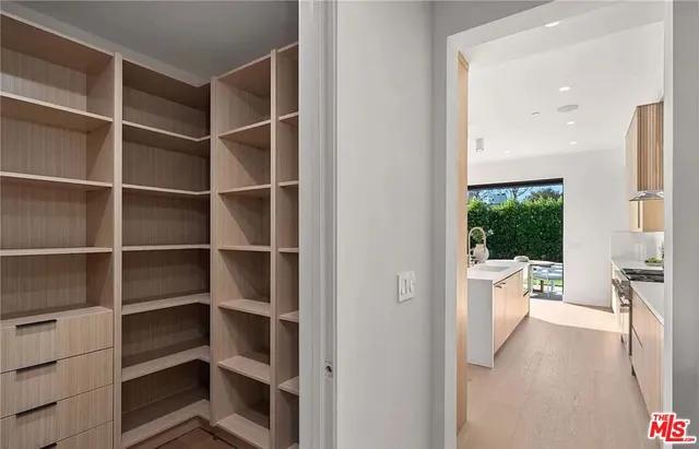 a view of a living room and a window