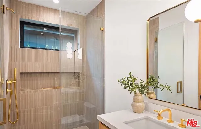 a view of a house with swimming pool and sitting area