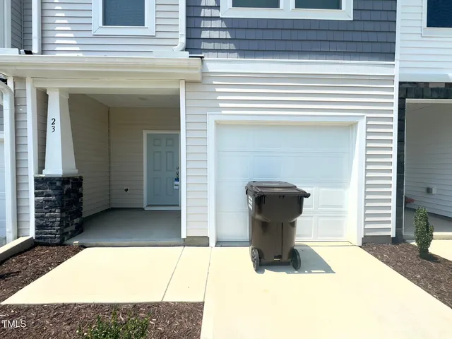 a view of a entryway door front of house