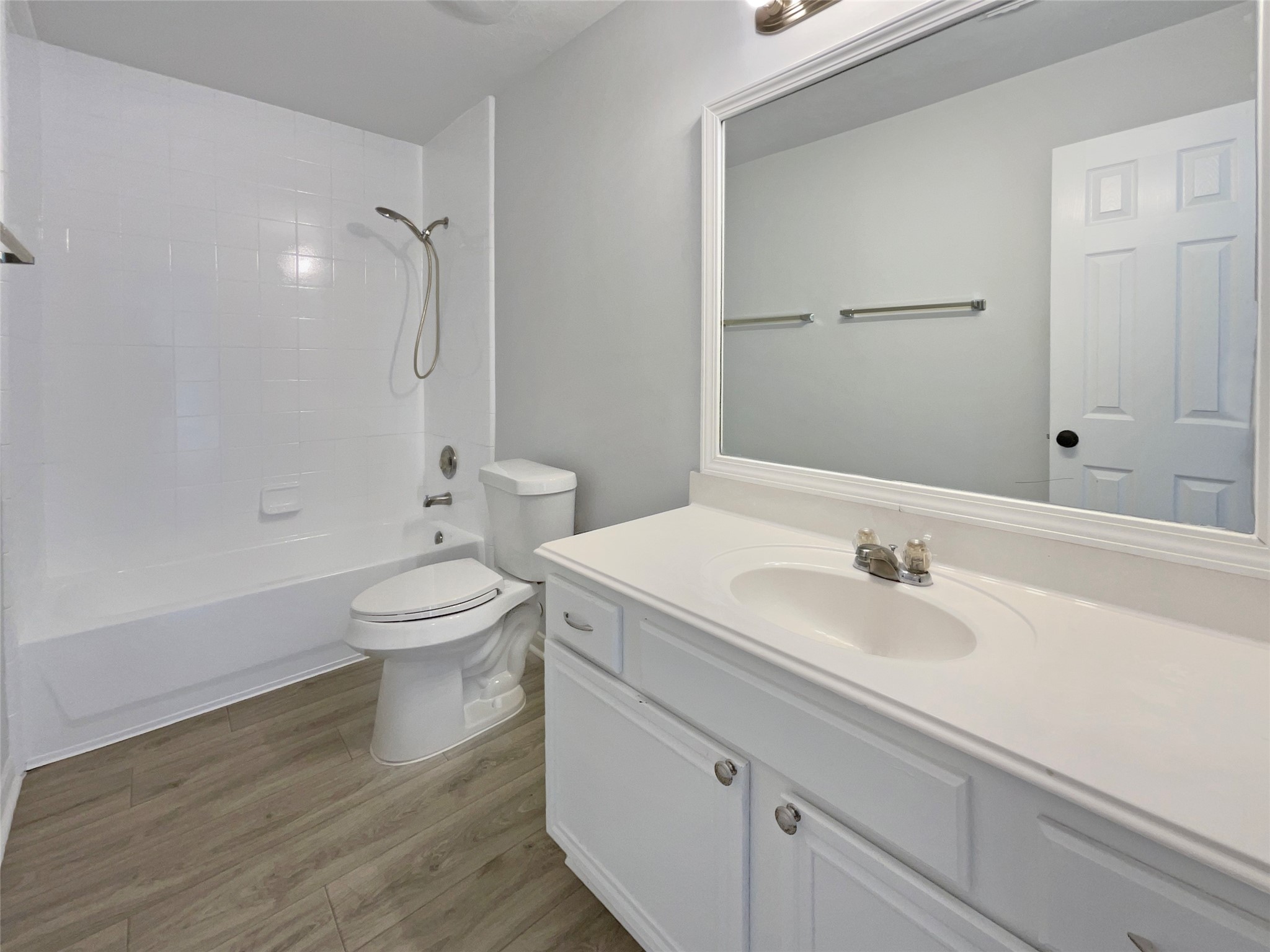 12111 Virline Lane Houston, TX 77067 - Photo 18 of 22 a bathroom with a sink a toilet and shower