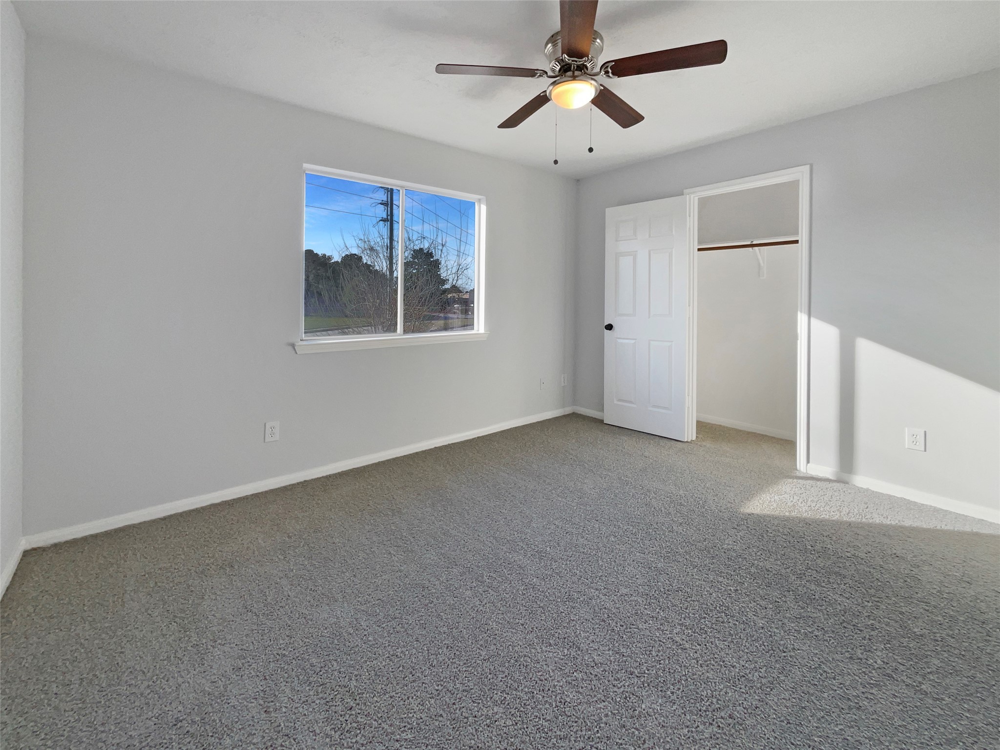 12111 Virline Lane Houston, TX 77067 - Photo 19 of 22 a view of a big room with carpet