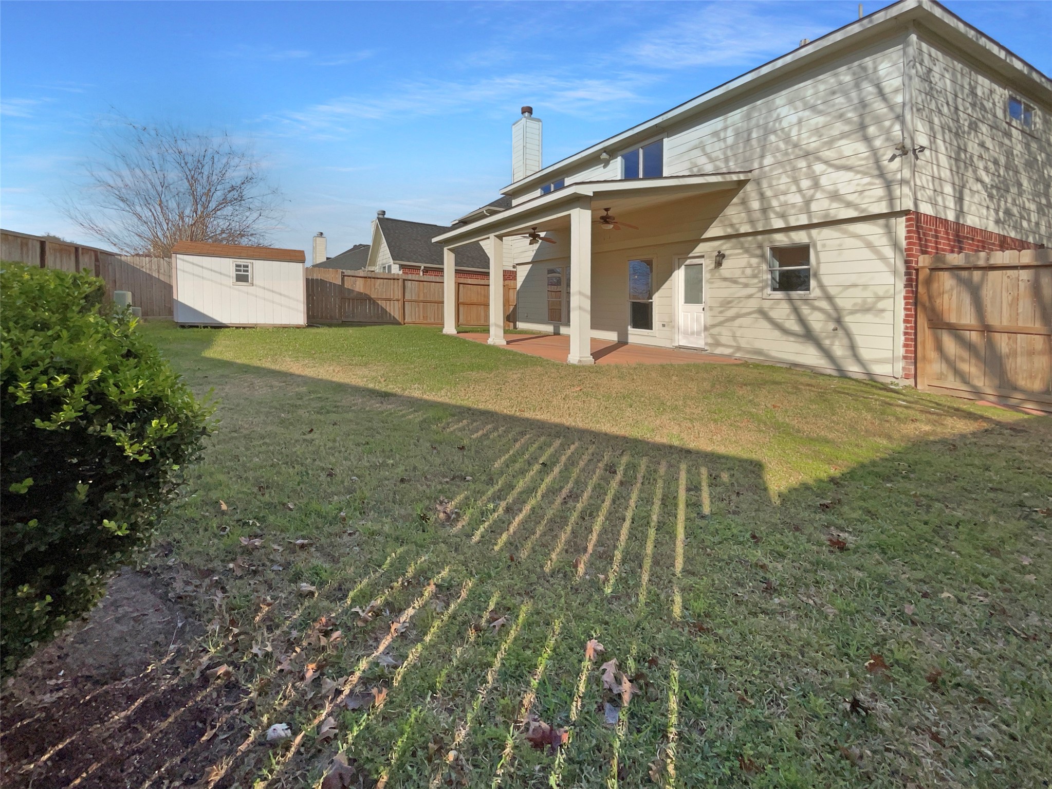 12111 Virline Lane Houston, TX 77067 - Photo 21 of 22 a view of a house with a yard