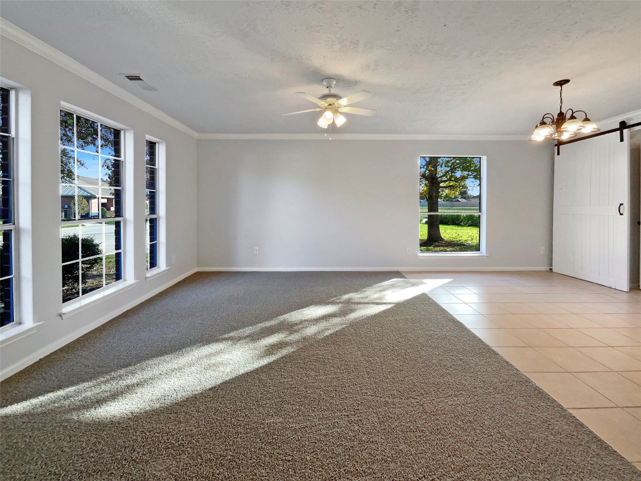 12111 Virline Lane Houston, TX 77067 - Photo 7 of 22 a view of an empty room with a window