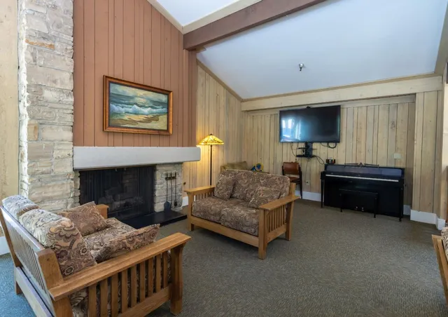 a view of a chairs and table in the patio
