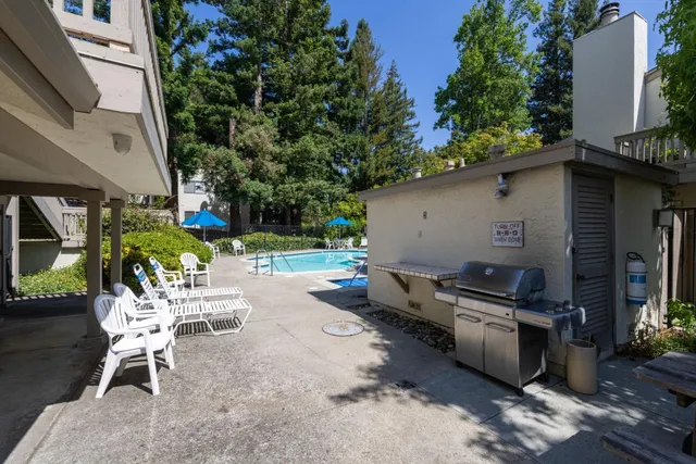 a view of a backyard with a patio