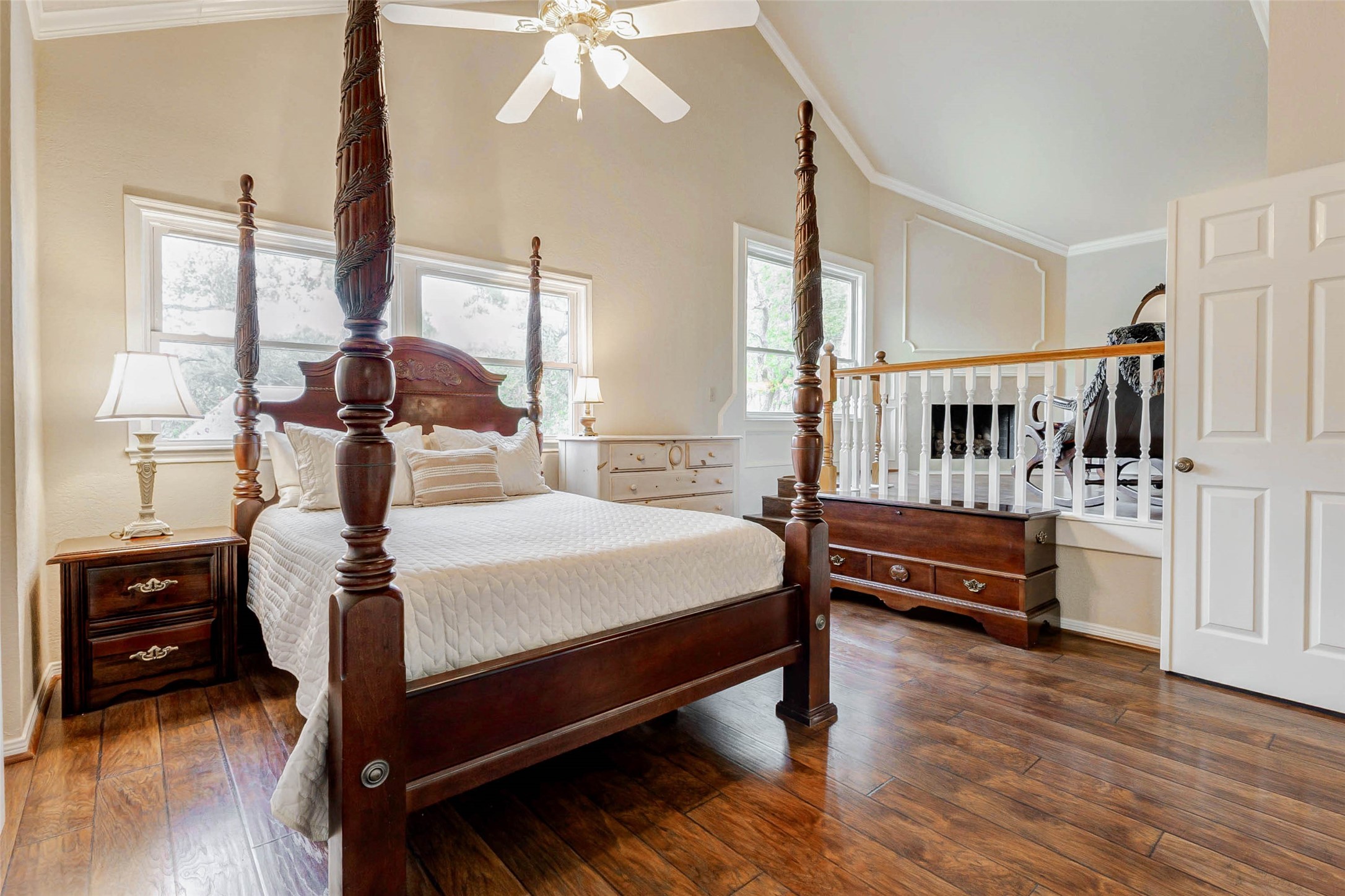 15811 Spring Forest Drive Houston, TX 77059 - Photo 17 of 27 This inviting primary suite features an elevated sitting or office area with a cozy fireplace, perfect for relaxation and productivity.